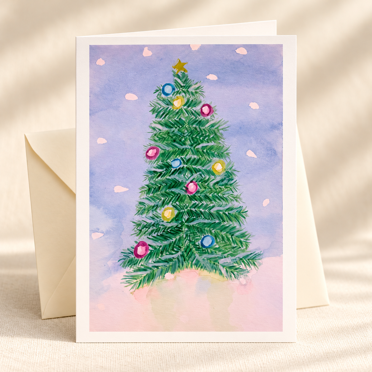 Green Tree watercolor greeting card with an ivory envelope on a clean ivory background