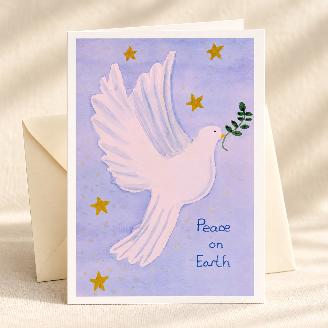 Peace Dove watercolor greeting card with an ivory envelope on a clean ivory background