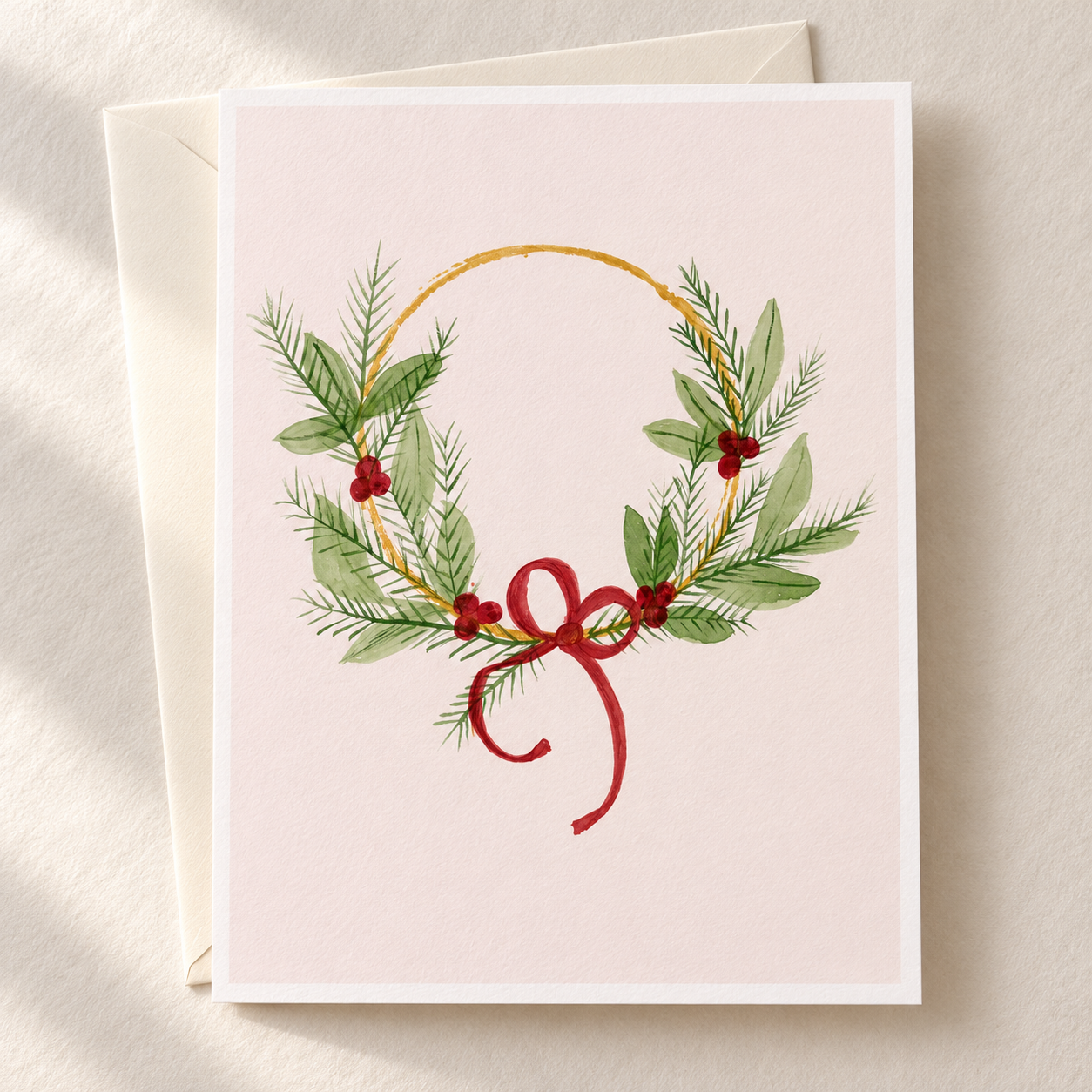 Ribbon and Berry Wreath watercolor greeting card with an ivory envelope on a clean ivory background — artwork preview, not yet printed